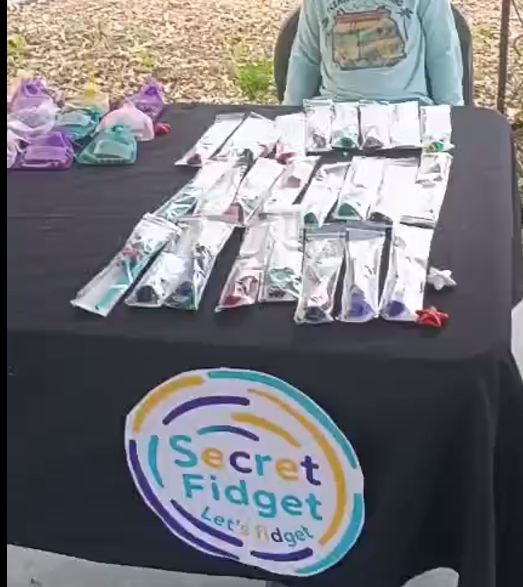 Young founder presenting a product during Market Day